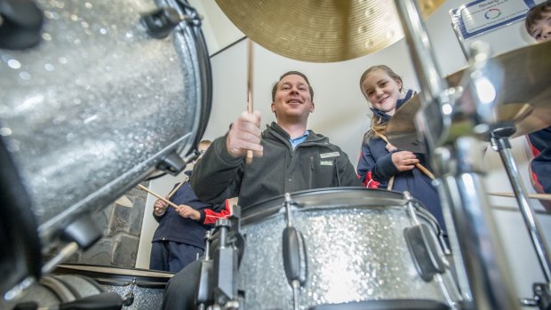 Talented musician Rory Turner-Quirk (pictured with student Isabelle Howarth) is the Googong Anglican School's new music teacher. 