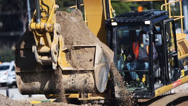 Work continues on the light rail project on Anzac Parade on Tuesday. 