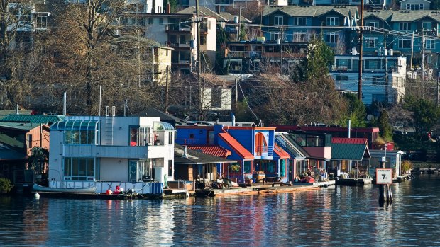 Houseboats permanently moored on shores of Lake Union.