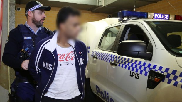Arrested: One of four men arrested for allegedly buying bank customers credit card details from a call centre worker.