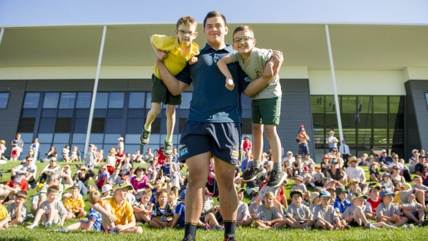 The Tuggeranong Vikings' Tyrel Lomax was a hit with the kids at a Brumbies fan day late last year.