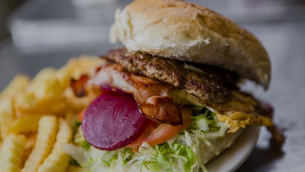 The Lachlan Court Cafe's old-school burger has lost none of its popularity. 