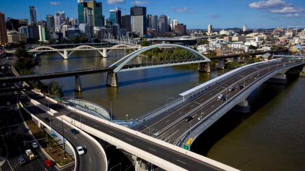 The RACQ says the Go Between Bridge (foreground) should be made toll free if the Victoria Bridge becomes a car-free zone.