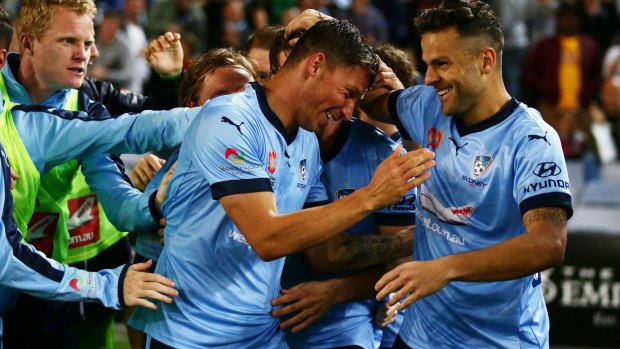 Flying high: Sydney FC sit on top of the A-League ladder after round one, thanks to their 4-0 demolition of Western Sydney Wanderers.