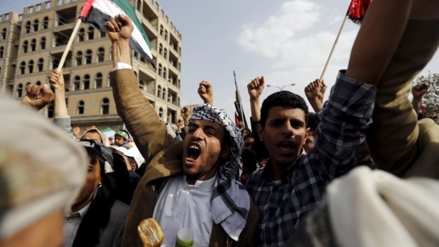 Houthi followers attend a rally in Yemen's capital Sanaa on Friday.
