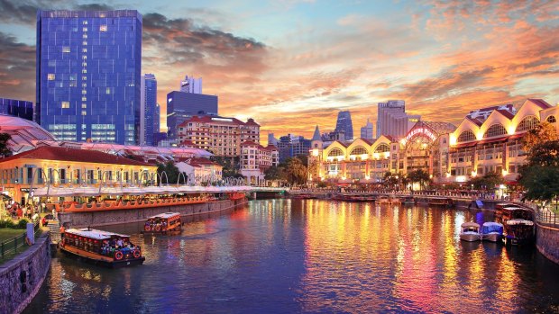 The Clarke Quay entertainment district flanks the Singapore River.