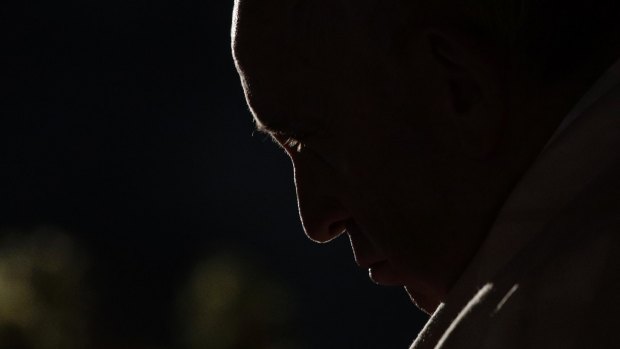 Pope Francis presides over the Via Crucis torchlight procession in Rome on Good Friday.