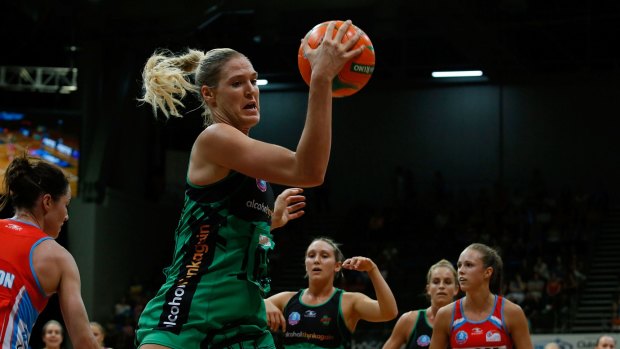 Fever pitch: West Coast Fever's Caitlin Bassett takes on the Sydney Swifts.