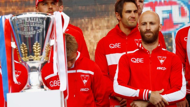 Eyes on the prize: Jarrad McVeigh looks at the premiership cup on Friday.