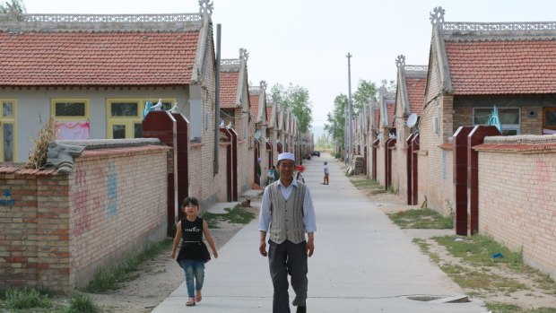 Hai Fuquan, 58, at a new resettlement village assigned to ecological migrants. The Ningxia government has moved about 350,000 people from ecologically fragile mountain areas to plains where they can better access water.