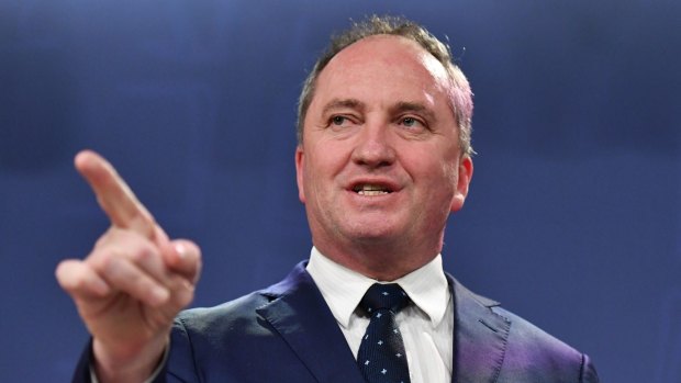 Deputy Prime Minister Barnaby Joyce makes a gesture during a press conference in Sydney, Wednesday, September 27, 2017. (AAP Image/Mick Tsikas) NO ARCHIVING
