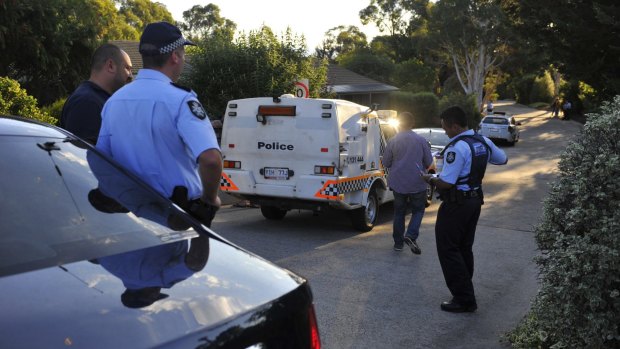 Police investigate the death of a woman at a Calwell home on Saturday.
