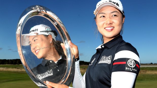 Reflected glory: Minjee Lee with the women's Vic Open trophy at 13th Beach Golf Links in Barwon Heads.