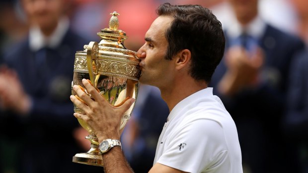 A familiar sight: Federer kisses the trophy after beating Marin Cilic.