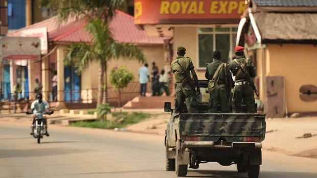 South Sudanese goverment soldiers drive through the streets of Juba, as the nation awaits the return of opposition leader and vice-president-designate Riek Machar. 