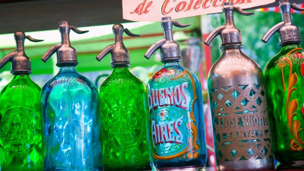 Soda syphons for sale at the San Telmo market in Plaza Dorrego.