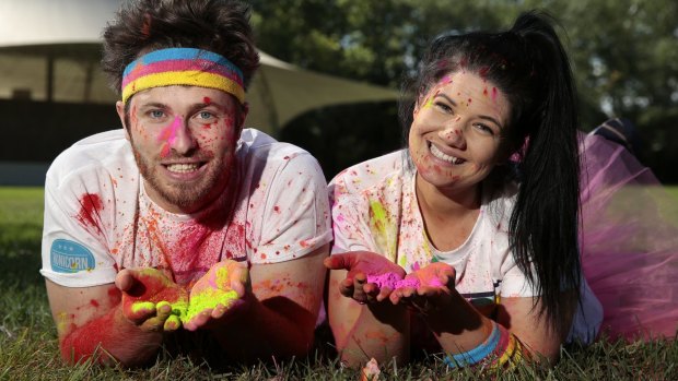 Ryan Jon and Tanya Hennessy threw themselves into Canberra life, including participating in the colour run.