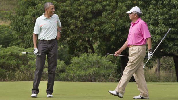 Choosing your clubs: US President Barack Obama, left, plays golf with Najib Razak in Hawaii on Christmas Eve, 2014.