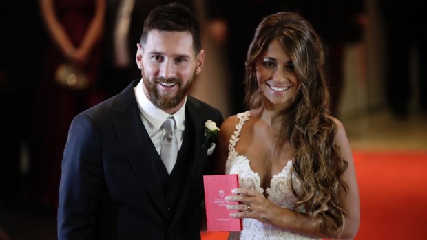 Newlyweds Lionel Messi and Antonella Roccuzzo after tying the knot in Rosario, Argentina, on Friday.