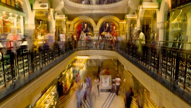 Shopping at the QVB in Sydney. Retailers are offering pre-Christmas discounts to bag more customers.