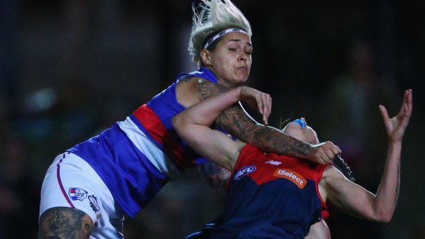 Collingwood's Moana Hope goes hard as a Bulldog in last year's highly successful exhibition match. She'll be a headline attraction in the season proper. 