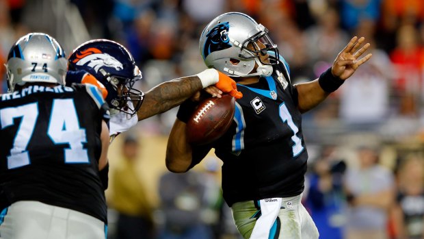 Denver's Von Miller forces Panthers quarterback Cam Newton to fumble.