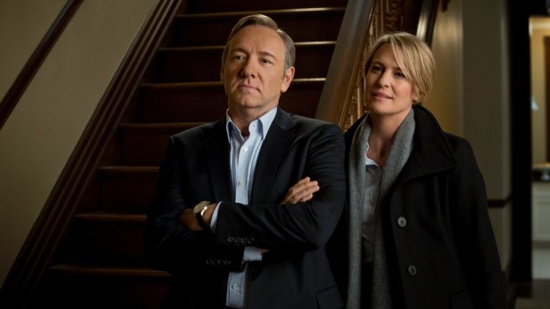 Kevin Spacey as Frank Underwood, with co-star Robin Wright, in House of Cards.