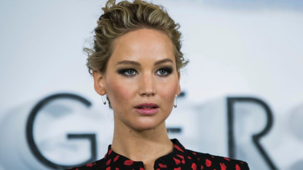 Jennifer Lawrence says that her 2014 nude photo hack left her feeling "gang-banged by the f---ing planet."