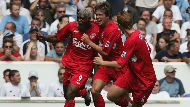 Trouble brewing: Former Liverpool star Djibril Cisse (left) has been arrested in connection with an extortion plot.