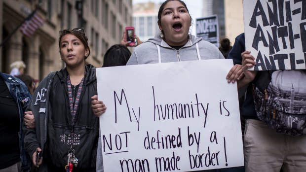 Demonstrators  protest the end of the Deferred Action for Childhood Arrivals (DACA) program in Chicago.