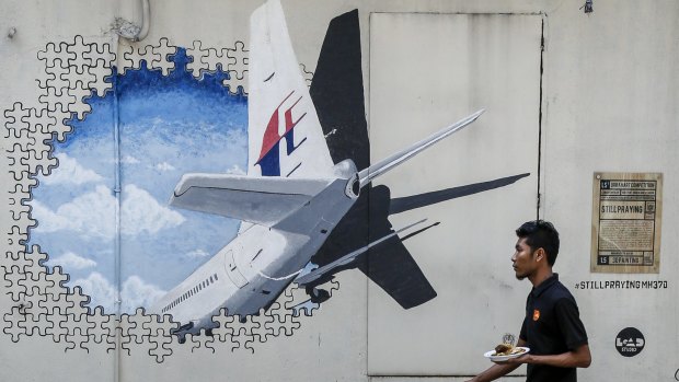 A mural of flight MH370 in Shah Alam, outside Kuala Lumpur, Malaysia. 