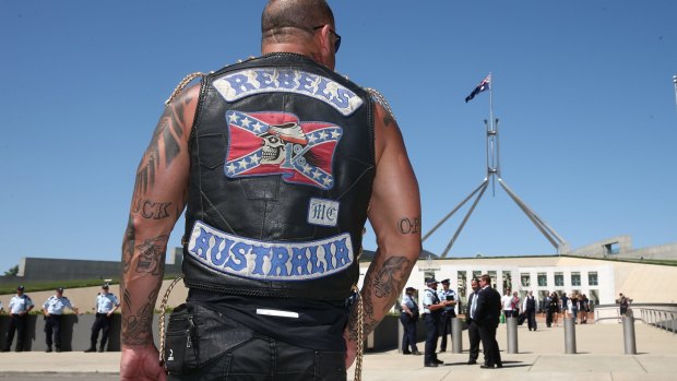 A bikie outside Parliament House in 2014 protesting against anti-consorting laws