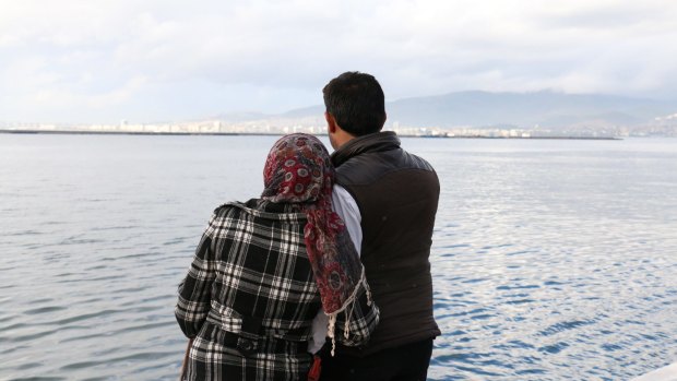 Syrians Um Muaad, 18 and her husband Abu Muaad, 30, in Izmir, Turkey, hoping to cross the Aegean Sea to Greece.