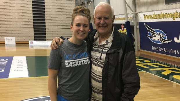 Canberra Capitals star Kate Gaze with her grandpa and former Australian Opals coach Tony Gaze after a WNBL game.