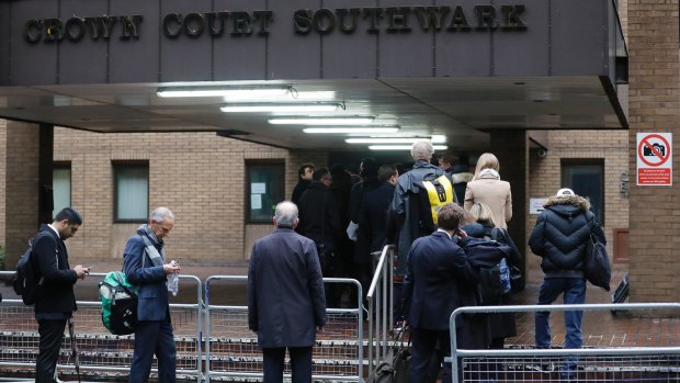 People queue to enter Southwark Crown Court in London, where the Rolf Harris trial is under way.