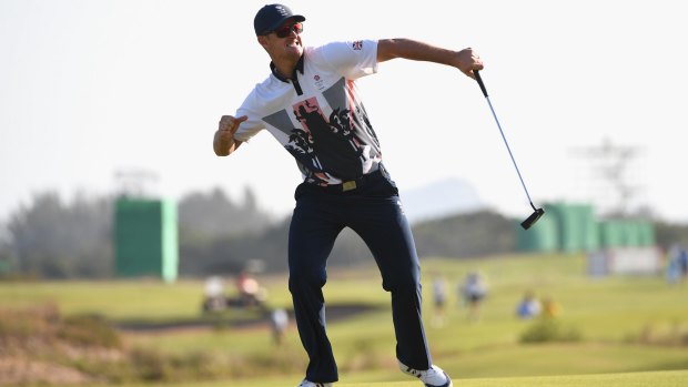 Justin Rose celebrates his victory.