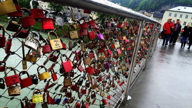 Love locks on Staatsbrucke bridge, Salzburg.
