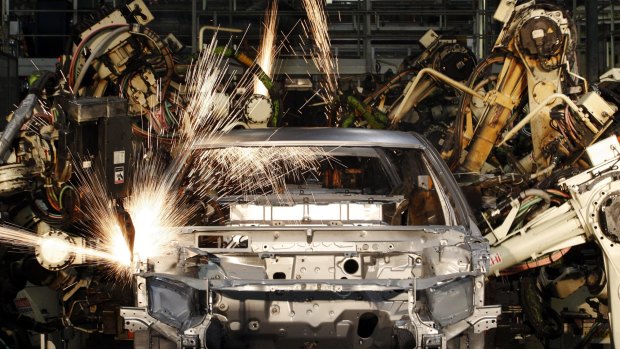 Robots put together a car at a Toyota factory in Australia.