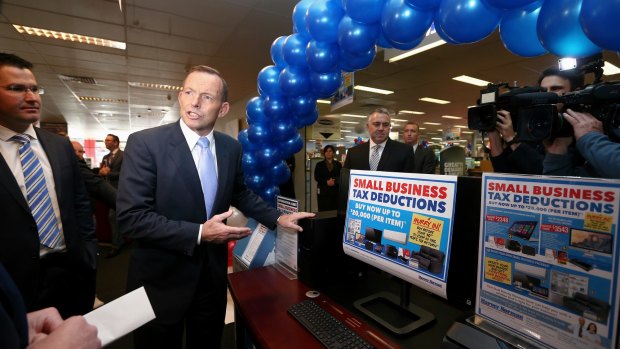 Prime Minister Tony Abbott, pictured visiting a store on Monday, says he  is yet to receive a letter from his MPs urging tougher steps against terrorists.