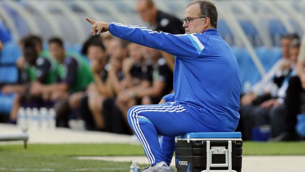 The only black mark on a fine afternoon for Marseille coach Bielsa came when he sat on his own cup of coffee in the technical area.
