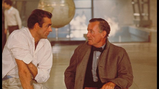 Sean Connery and author Ian Fleming discuss the character of James Bond while filming an interior scene for <i>Dr No</i> in 1962.
