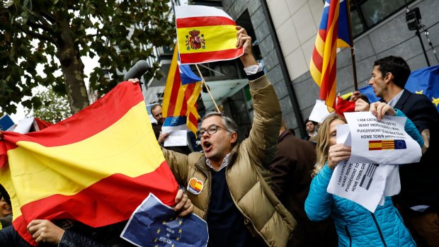 Protesters at a gathering of pro and anti-Spanish unity demonstrators following a news conference with Carles Puigdemont in Brussels on October 31.