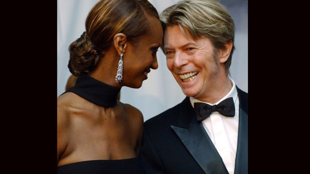 Iman, left, and her husband, singer David Bowie arrive at the Council of Fashion Designers of America Fashion Awards in New York. 