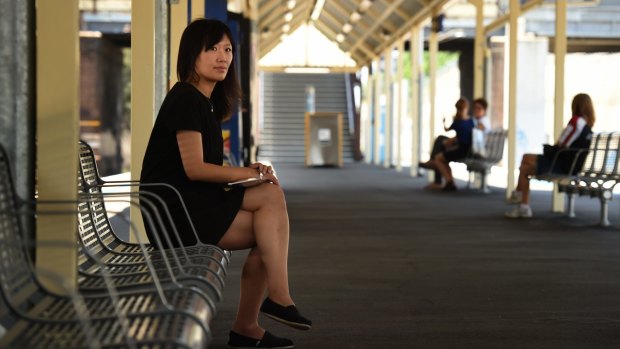 Vivian Feng (left) from West Ryde waits for the train at Chester Hill station. 