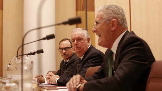 7-Eleven's Michael Smith, Russell Withers and Robert Bailey front the inquiry. 