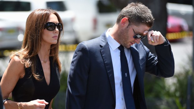 Michael Clarke and wife Kyly at Phillip Hughes' funeral.
