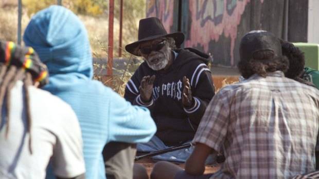 Johnny Japangardi "Hooker Creek" Miller shared stories of his life and Dreamtime with teenagers at Mount Theo.