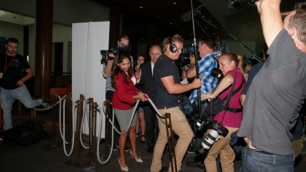 Members of the media almost trip over a bollard after a Parliamentary security guard put it in their way while interviewing Communications Minister Malcolm Turnbull in March.
