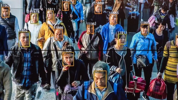 A CCTV display using the facial-recognition system Face in Beijing.