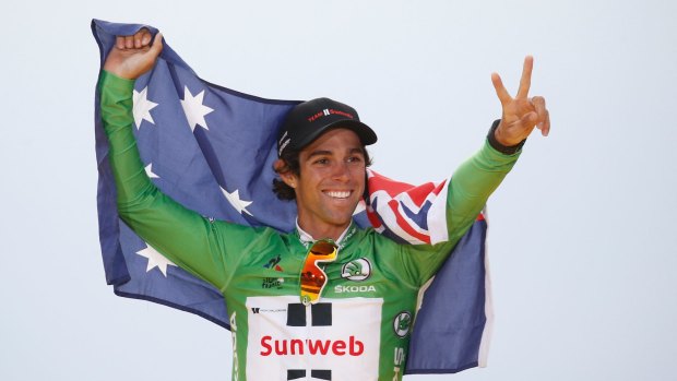 Canberra's Michael Matthews celebrates after claiming the green jersey.
